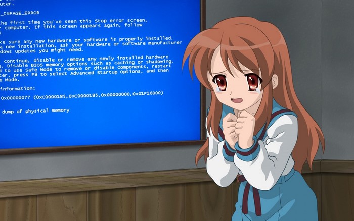 Anime girl crying in front of a blue screen error