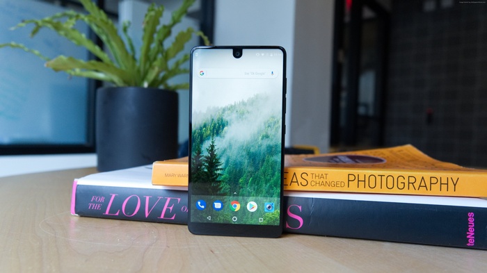 Smartphone with Android 9.0 on books