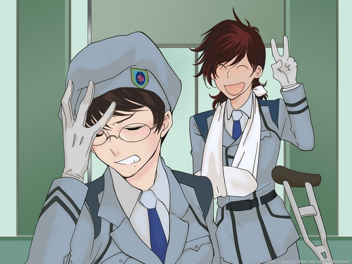 Two men in uniform, one with a cast and crutch