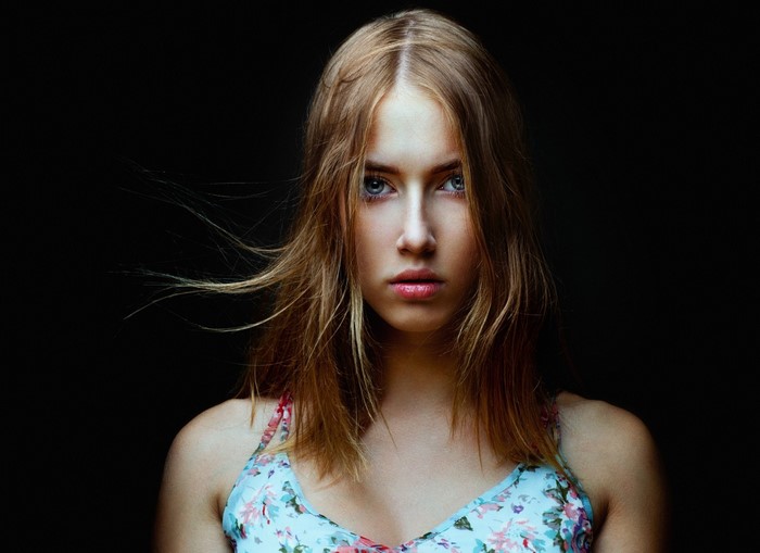 Portrait of a young woman with blonde hair
