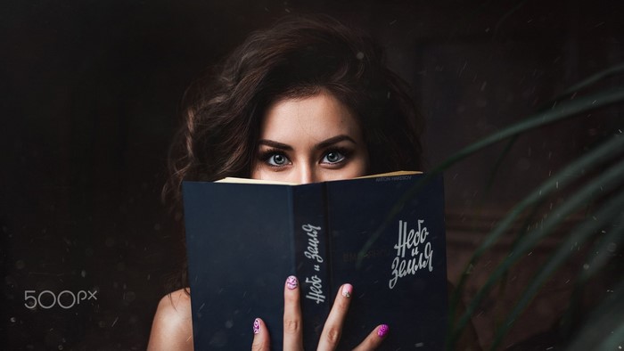 Woman reading a book, 500px