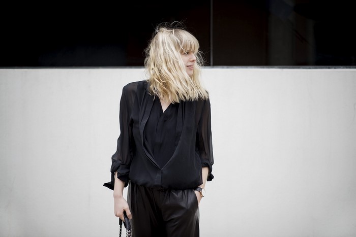 Woman in black outfit by Lisa Dengler