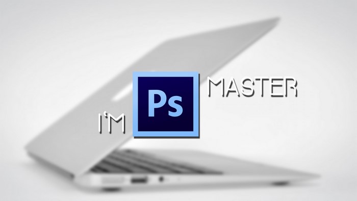 Photoshop logo on a laptop with text