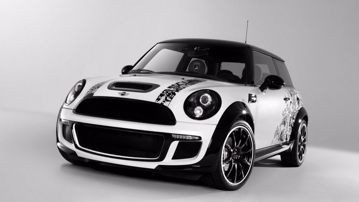 White Mini Cooper with black accents and graphics