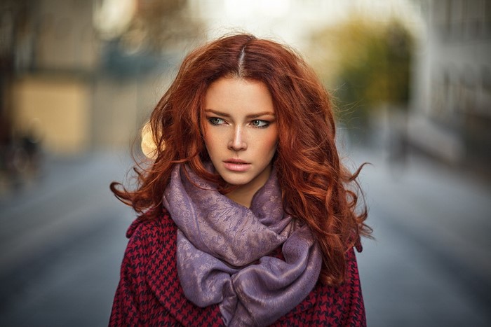 Woman with red hair and scarf