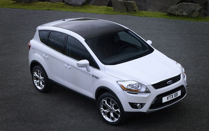 White Ford Kuga SUV parked on asphalt