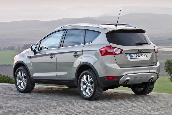 Ford Kuga SUV parked outdoors with hills in background