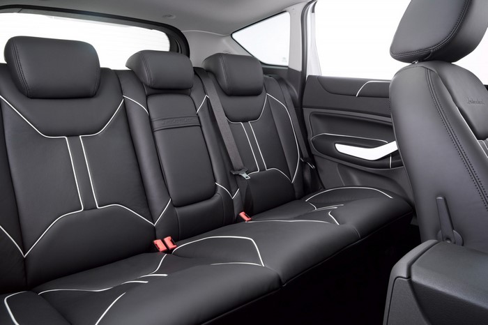 Black leather car interior with white stitching