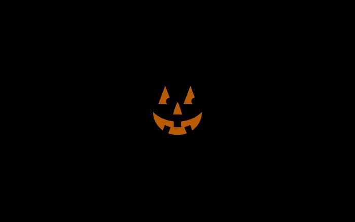 Halloween pumpkin logo on black background