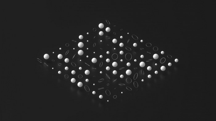 Monochrome pattern of white spheres and rings on black