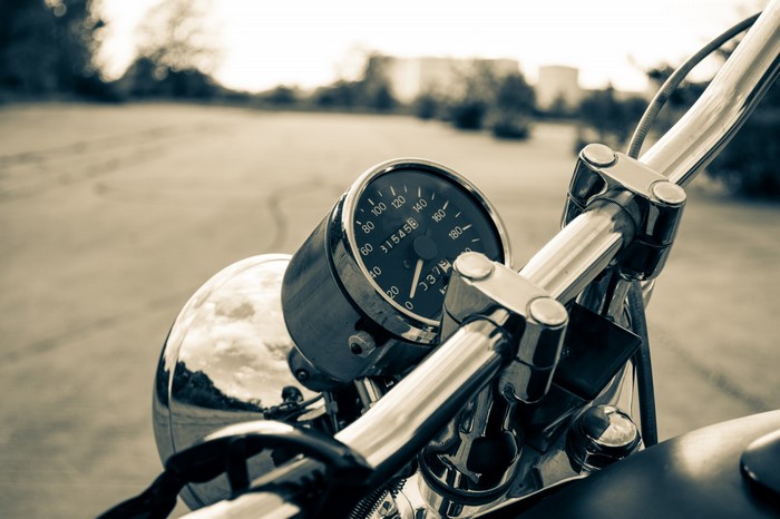 Motorcycle speedometer and handlebars