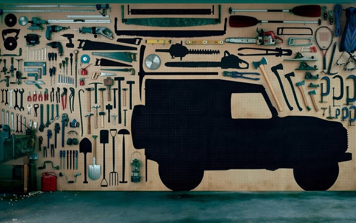 Vehicle silhouette with tools on a pegboard