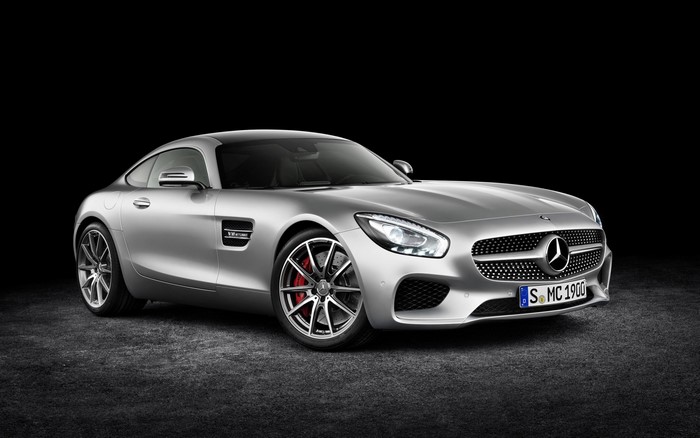Silver Mercedes-AMG GT sports car on a dark background
