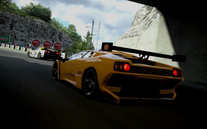 Lamborghini Diablo on a race track with other cars