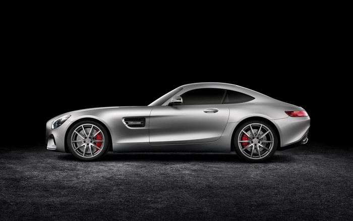 Silver Mercedes-AMG GT sports car on dark background