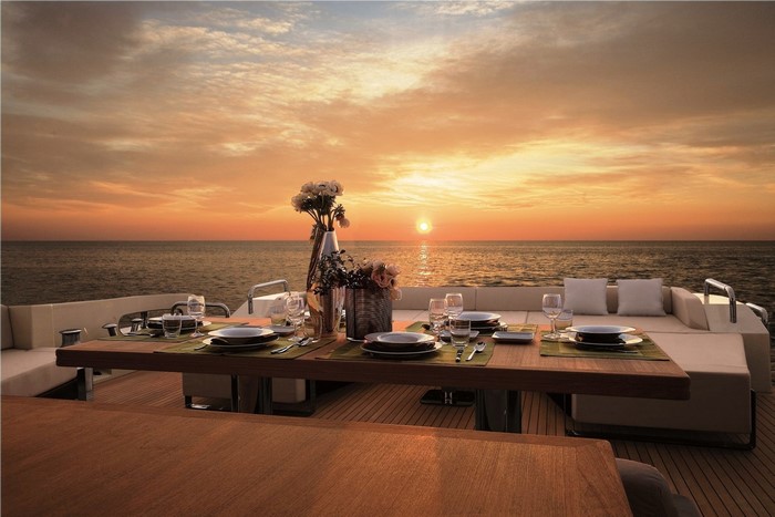 Luxury Yacht Dining at Sunset over the Sea