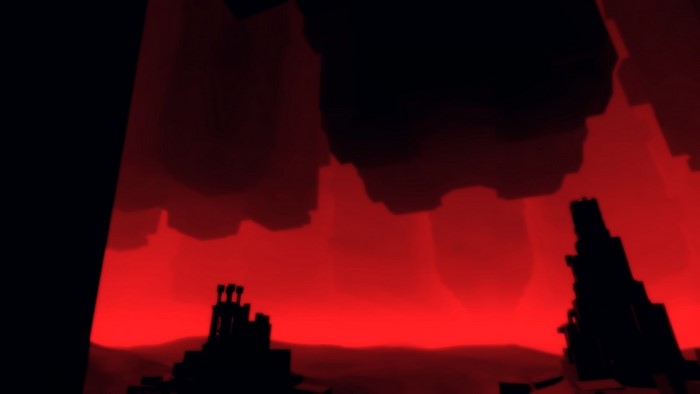 Silhouette of temples against a red sky