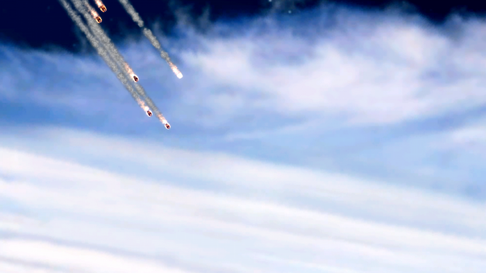 Meteors falling through the sky