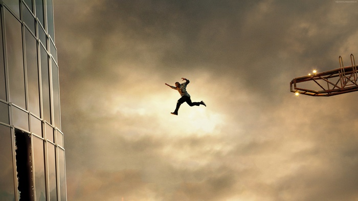 Dwayne Johnson jumping between buildings