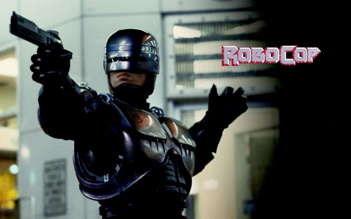 RoboCop from RoboCop holding a gun