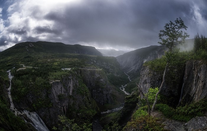 Dramatic Canyon Landscape with River and Waterfall in Norway