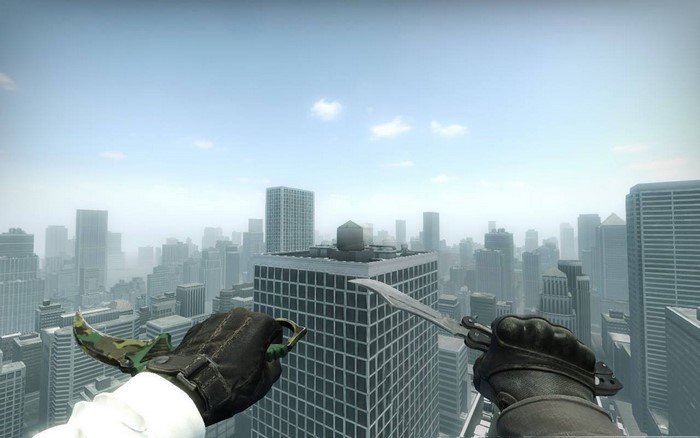 Counter Strike: Global Offensive butterfly knives over city skyline