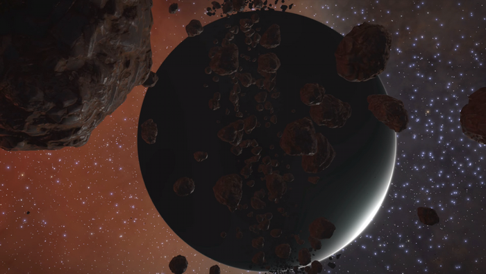 Planet and asteroids in space with stars