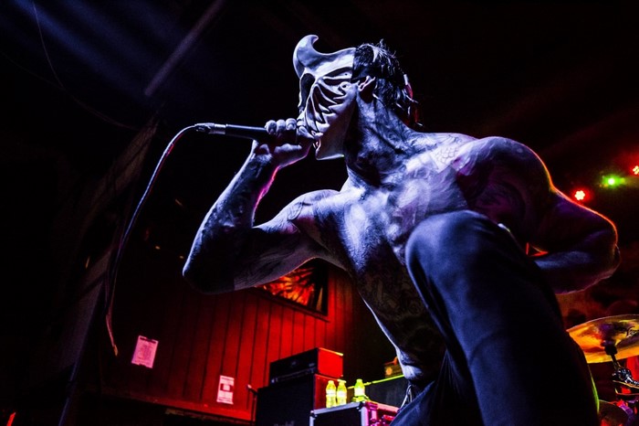 Alex Terrible of Slaughter to Prevail performing on stage