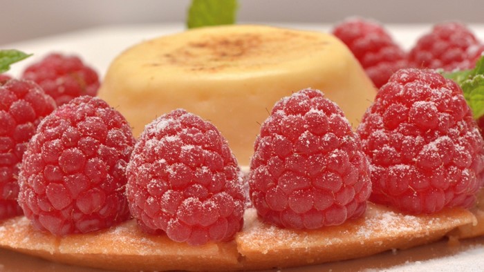 Dessert with raspberries and creme brulee