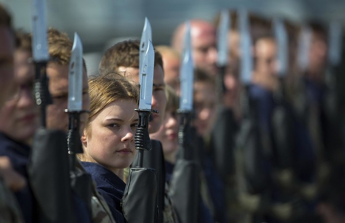 Soldiers in uniform with bayonets