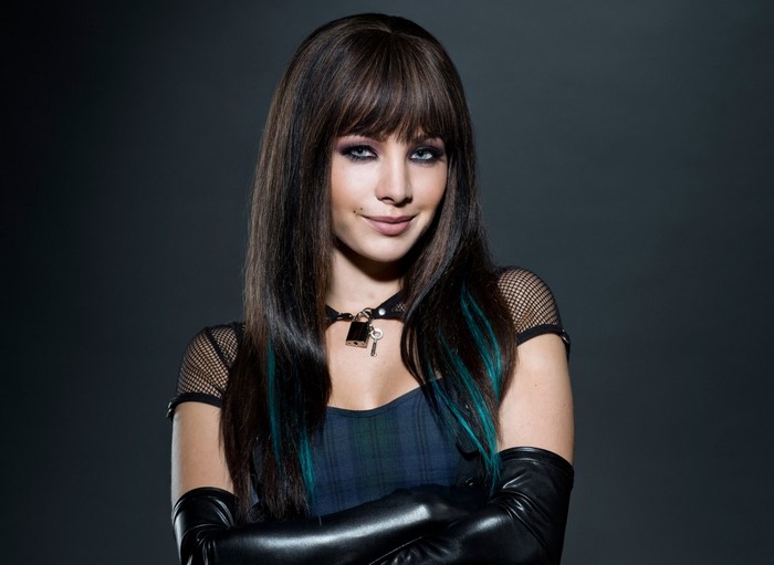 Ksenia Solo portrait with dark background