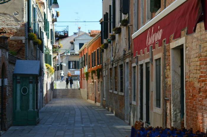 Venice street with buildings and stairs