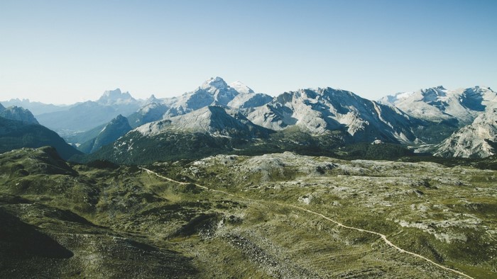 Mountain range with a valley and a hiking path