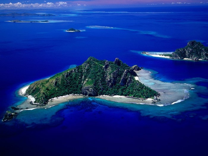 Aerial view of islands in a blue ocean