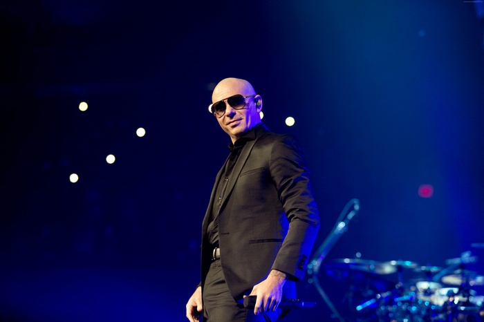 Pitbull performing on stage