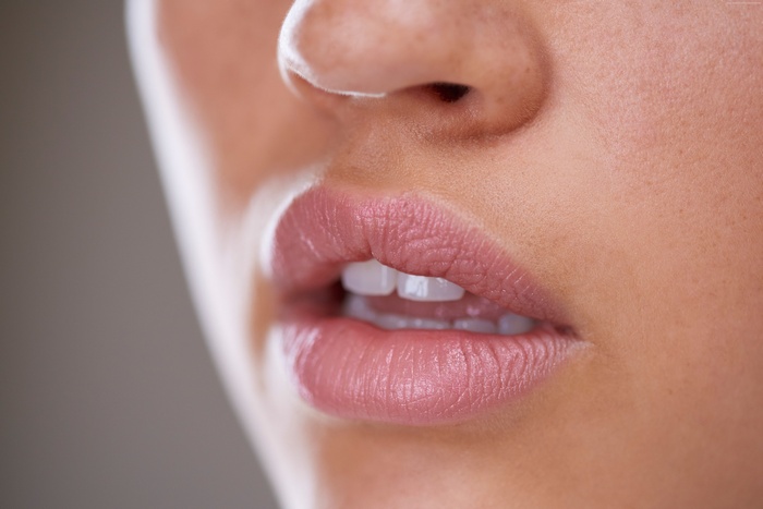 Close-up of woman's lips and nose