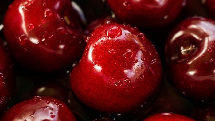 Close-up of wet red cherries