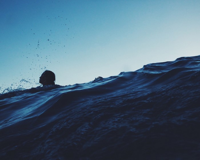Person swimming in the ocean