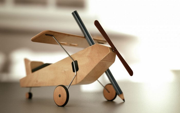 Wooden toy airplane with pencil propeller