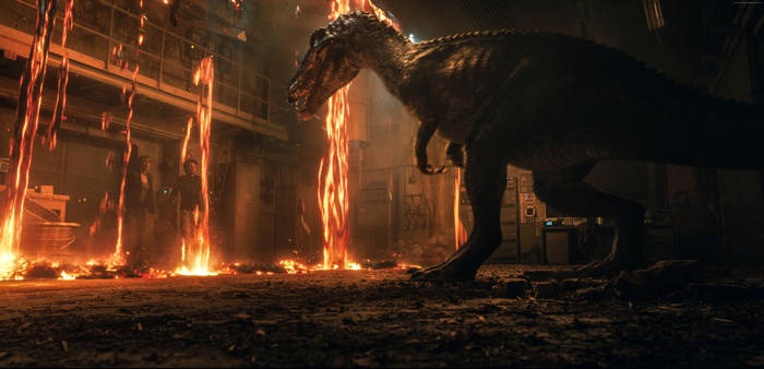 Dinosaur in a burning laboratory with people