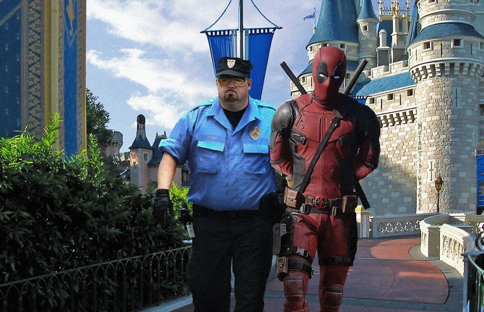 Deadpool with a security guard at a castle