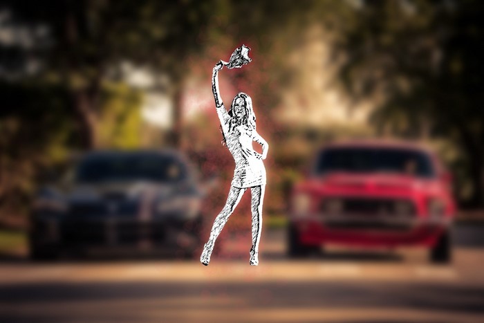Woman in minidress with cars
