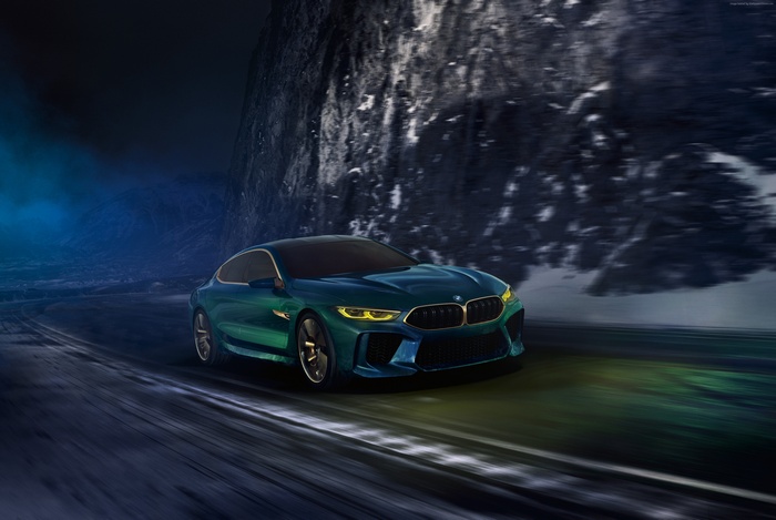 BMW M8 Gran Coupe concept car on a snowy road
