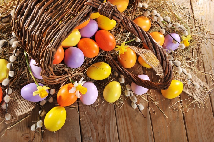 Easter eggs spilling from a basket