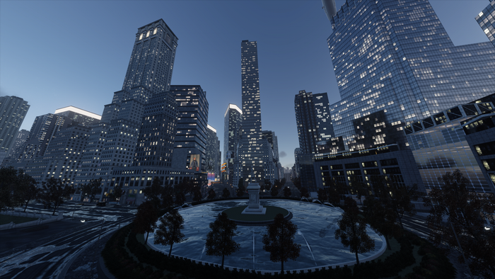 Cityscape at night with skyscrapers and a fountain