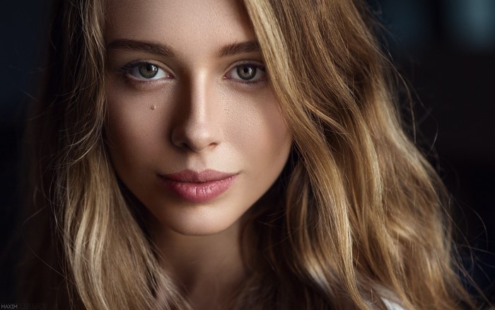 Close-Up Portrait of Woman with Long Blonde Hair
