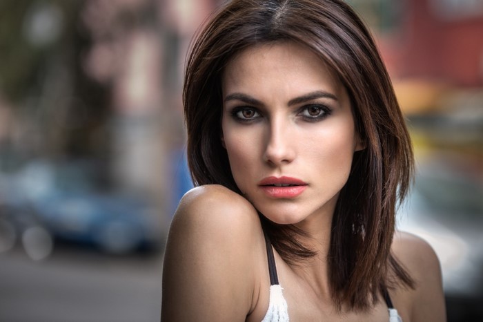 Close-up Portrait of a Brunette Woman with Smoky Eyes