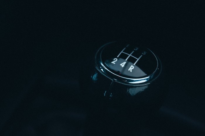 Close-up of a manual car gear shift knob
