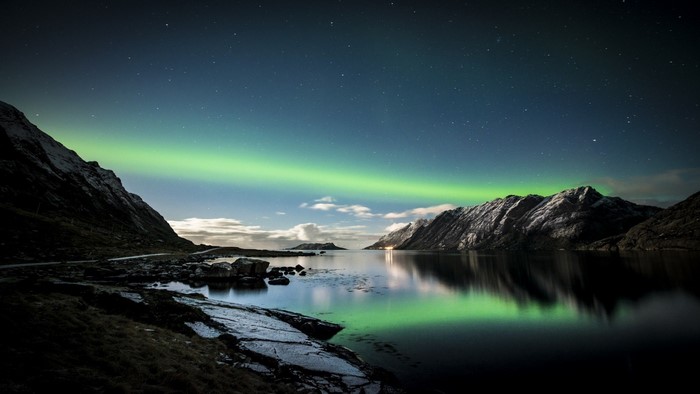 Aurora Borealis over a Fjord with Mountains