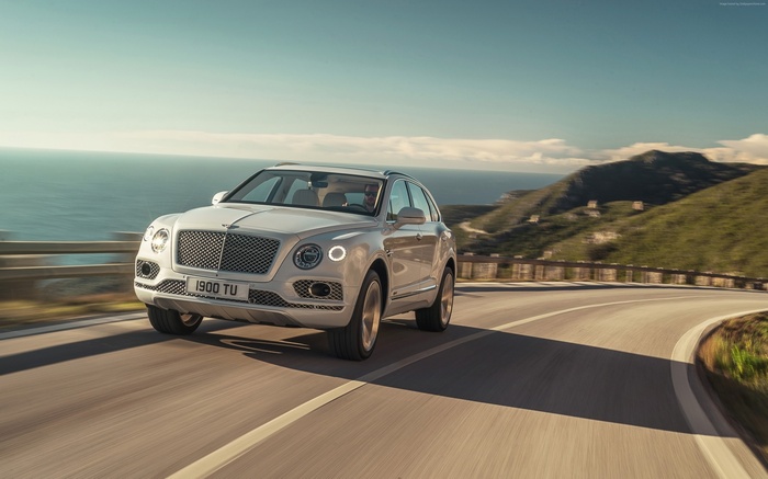 Bentley Bentayga Hybrid on a coastal road